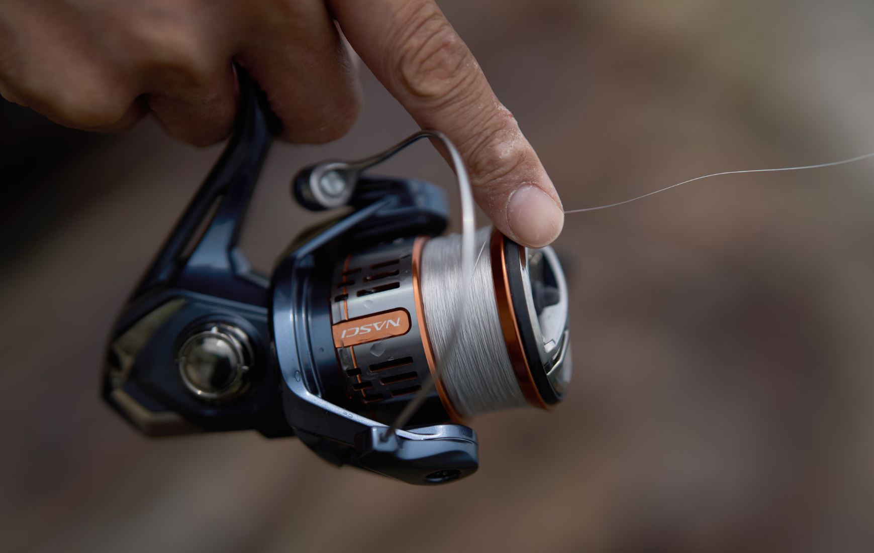 Катушка Shimano Nasci 2500  25 — крупный план
	                                    3