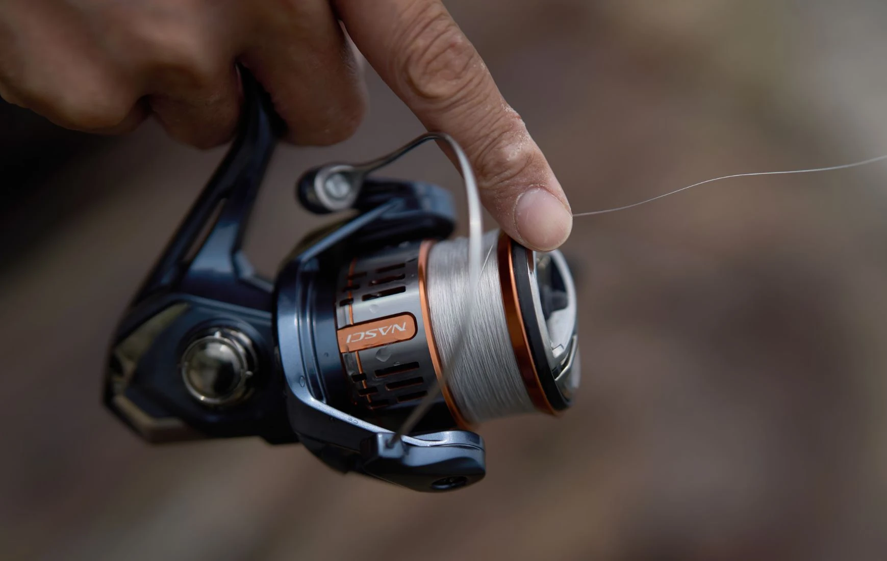 Катушка Shimano Nasci 2500  25 — крупный план
	                                    3