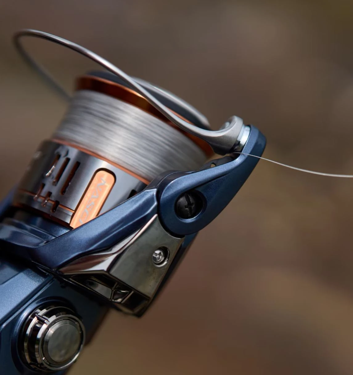 Катушка Shimano Nasci 2500  25 — крупный план
	                                    2